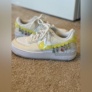 Nikes White & yellow with Nike charms size 7